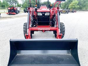 THOSE EXTENDED WORKDAYS COMFORTABLE The mComfort seat is designed for maximum ergonomic convenience 4500 Series 4550 4WD Color Red Engine Four-stroke 