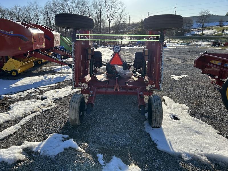 Bush Hog 2215 Flex-Wing rotary cutter is designed to cut grass 