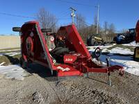 Bush Hog 2215 Flex-Wing rotary cutter is designed to cut grass 