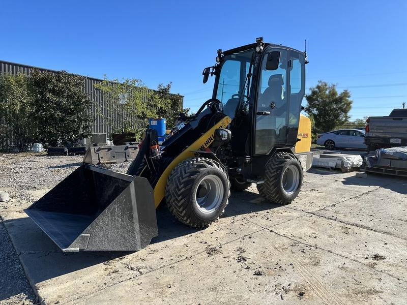 New Holland Construction Model ML23 Vehicle Type Loader Category Small Articulated Loader Payments Get an Estimate for Your Payment Payment Frequency showcases a lifting capacity of 4 